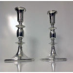 Cartier pair of sterling silver candlesticks, Cartier, mid 20th century.  Preview