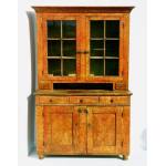 PENNSYLVANIA DUTCH CUPBOARD IN BITTERSWEET ORANGE PAINT, WITH SPONGE-DECORATED SURFACE, ON TURNED FEET, FOUND IN READING, 1840-1870 Preview