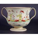 A Large English Pottery Creamware Polychrome Chinoiserie decorated Two- handled Loving Cup, Circa 1785.  Preview