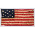 A HIGHLY UNUSUAL, ENTIRELY HAND-SEWN 13 STAR FLAG, CA 1850 � CIVIL WAR ERA (1861-65), WITH A HUGE STAR IN THE UPPER HOIST END CORNER OF A 3-2-3-2-3 CONFIGURATION: Preview