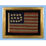 RARE AND BEAUTIFUL 13 STAR, CIVIL WAR PERIOD FLAG WITH A PERIMETER OF STARS THAT FORM THE LETTER �U� FOR �UNION�. ENTIRELY HAND-SEWN AND IN A RARE SMALL SIZE, 1861-65: Preview