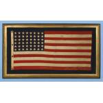 WWII BATTLE FLAG FROM THE U.S.S. FLINT WITH 48 STARS, BROUGHT HOME BY FIREMAN 2ND CLASS F. W. PERRINE, EMBROIDERED WITH HIS NAME, THE SHIP�S NAME, AND DATES OF SERVICE: Preview